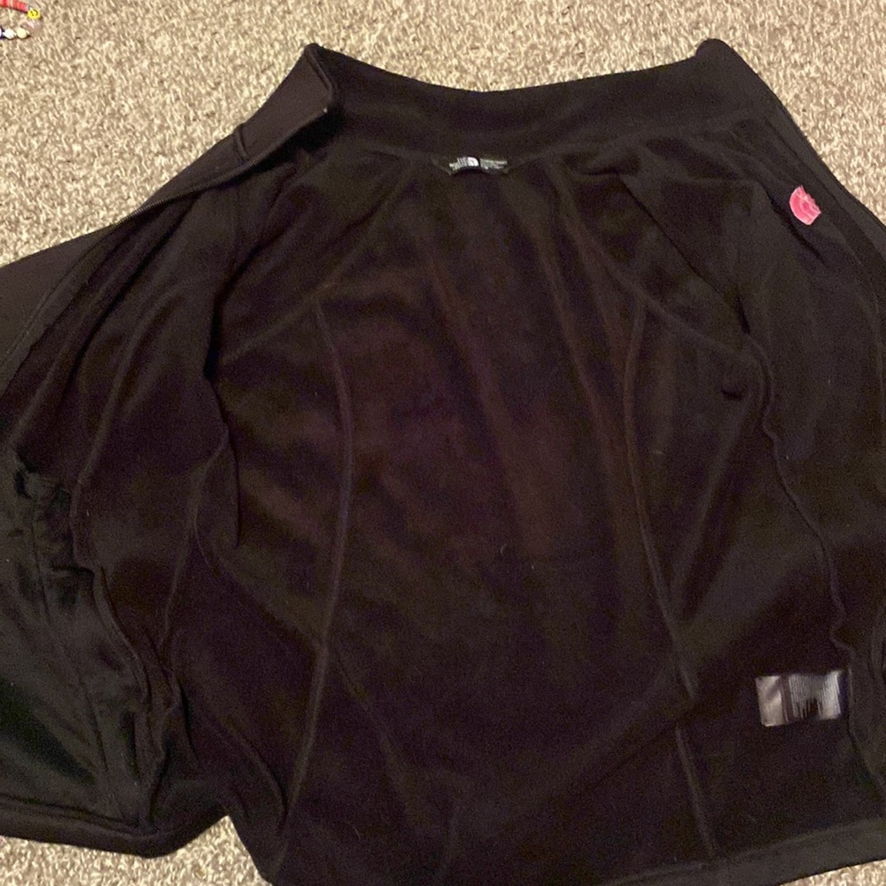 This jacket is from the north face!! And it supports Breast cancer